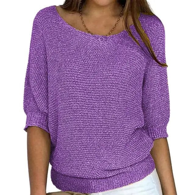 Beige relaxed-fit knit sweater with batwing sleeves and wide neckline for effortless layered style