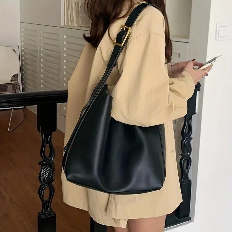 Wavlynn structured vegan leather shoulder bag with wide adjustable strap, polished finish for women