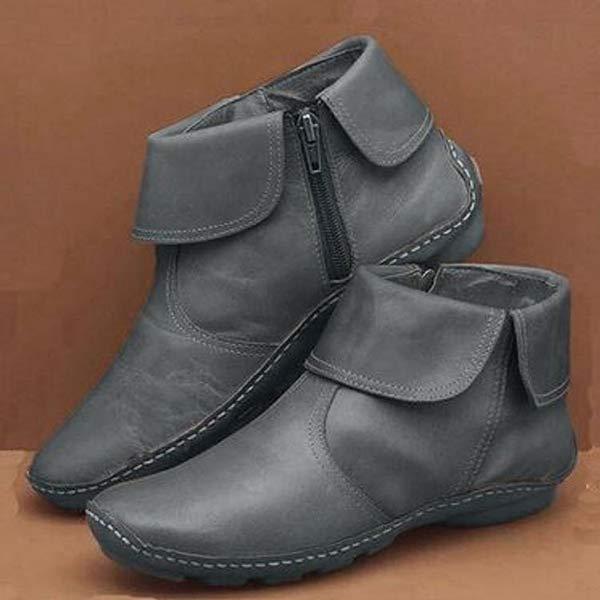 Women's black faux leather ankle boots, elegant slip-on design with cushioned insole for all-day comfort