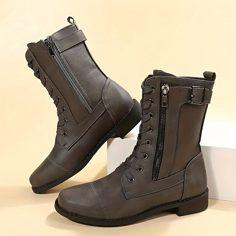 Women's black side zip ankle boots with clean modern design and secure snug fit for all-day comfort