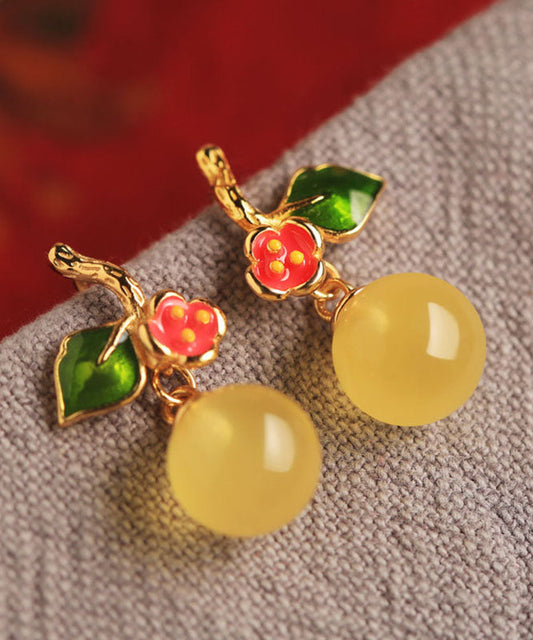 Boucles d'oreilles pendantes élégantes en argent sterling jaune, émail et cire d'abeille. - Wavlynn