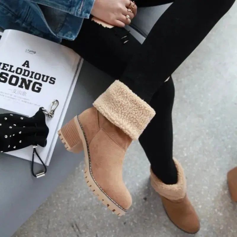 Women's suede ankle boots in neutral tone, elegant winter style with warm plush lining