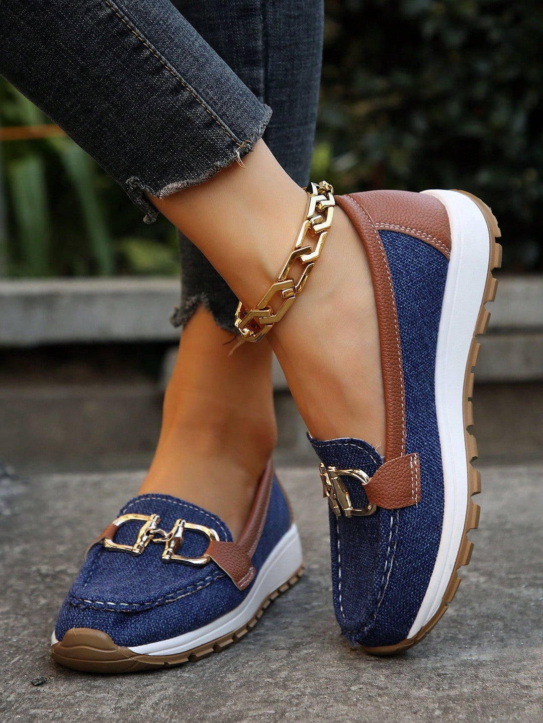 Women's suede-like loafers with elegant gold buckle detail, timeless silhouette for all-day comfort