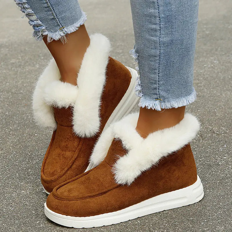 Women's cozy suede winter boots with plush faux fur lining, elegant silhouette for stylish cold-weather wear