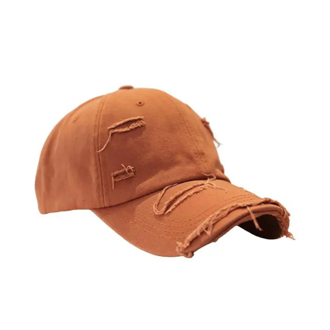 Vintage distressed cotton baseball hat with extended brim and ripped details, structured interlayer