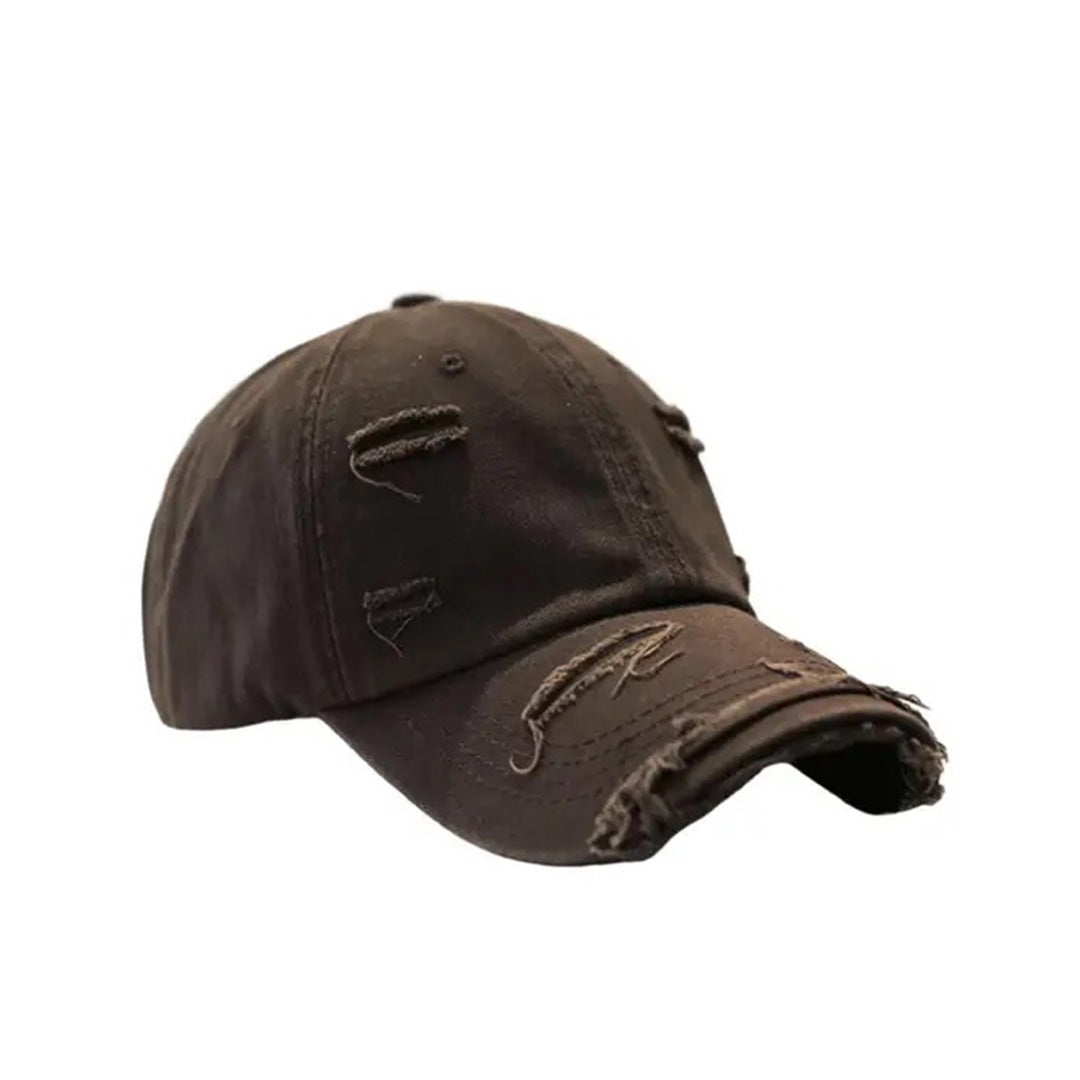 Vintage distressed cotton baseball hat with extended brim and rugged ripped detailing, multiple colors