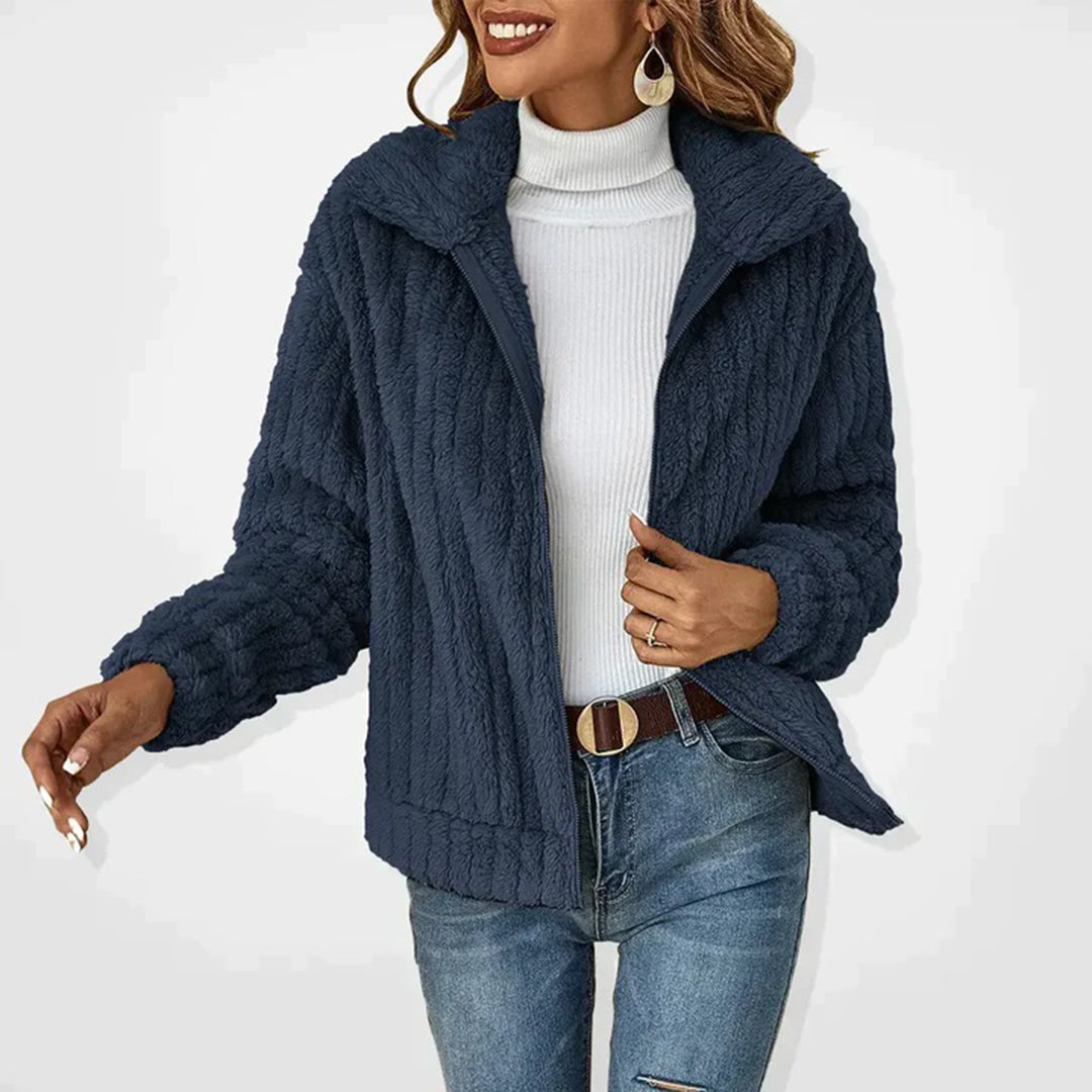 Beige fuzzy zip jacket with plush faux fur fleece, relaxed hip-length fit for cozy fall style