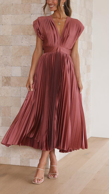 Elegant pleated maxi dress in flowing silhouette, designed for refined women seeking timeless sophistication