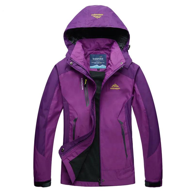 Women's waterproof rain jacket relaxed fit with adjustable hood and zippered pockets for everyday wear
