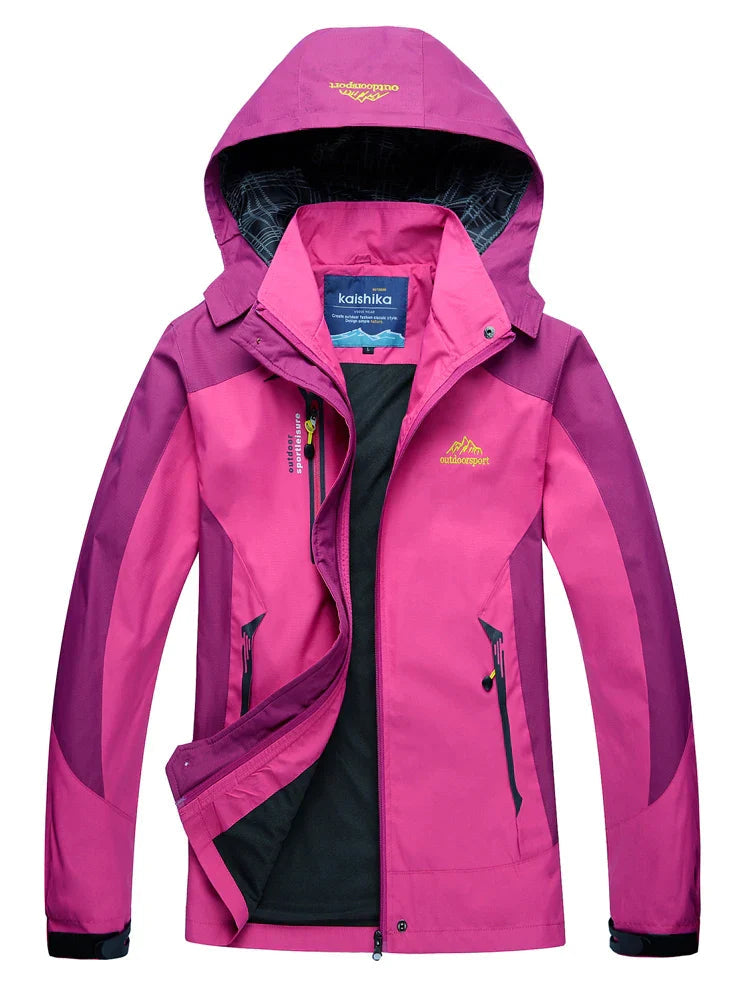 Women's waterproof rain jacket relaxed fit with adjustable hood and zippered pockets for all-weather wear
