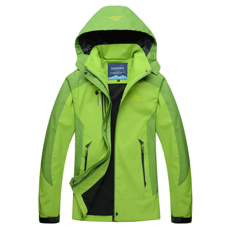 Women's waterproof relaxed fit rain jacket with adjustable hood and zipper pockets for everyday wear