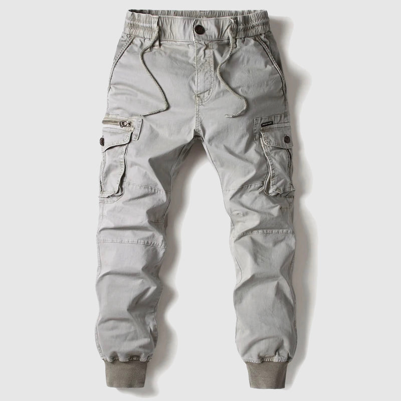 Slim-fit tactical cargo pants in cotton with elastic ankle band and multiple pockets
