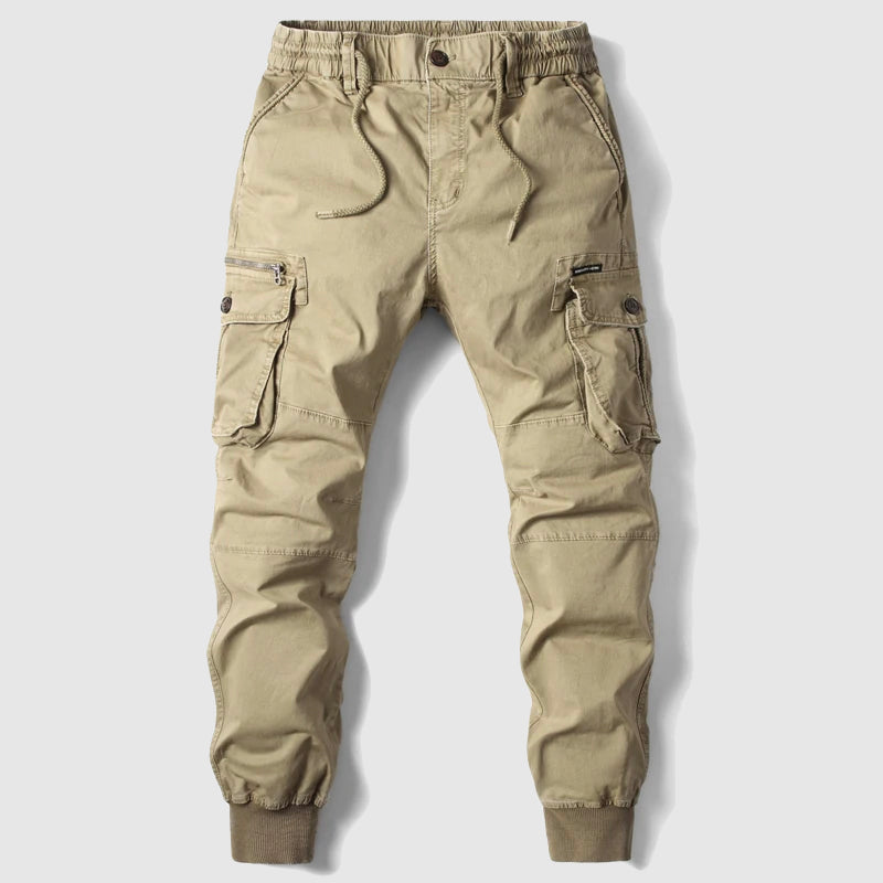 Slim-fit tactical cargo pants in cotton with ankle elastic band and multiple pockets