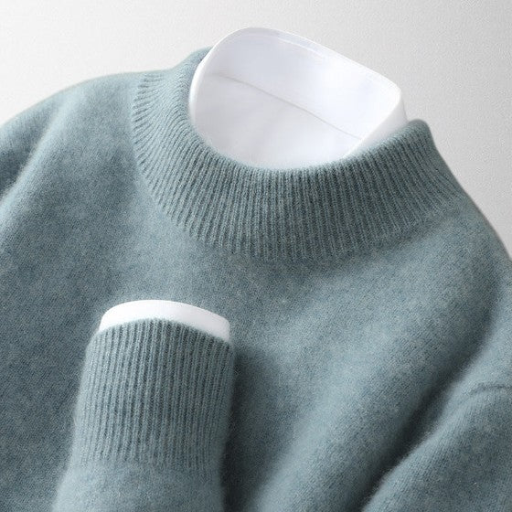 Tahlia ivory cashmere crew neck pullover with relaxed fit and extended ribbed hem edges
