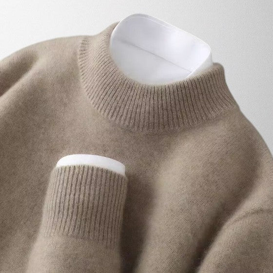 Tahlia ivory cashmere crew neck pullover with relaxed fit and extended ribbed hem