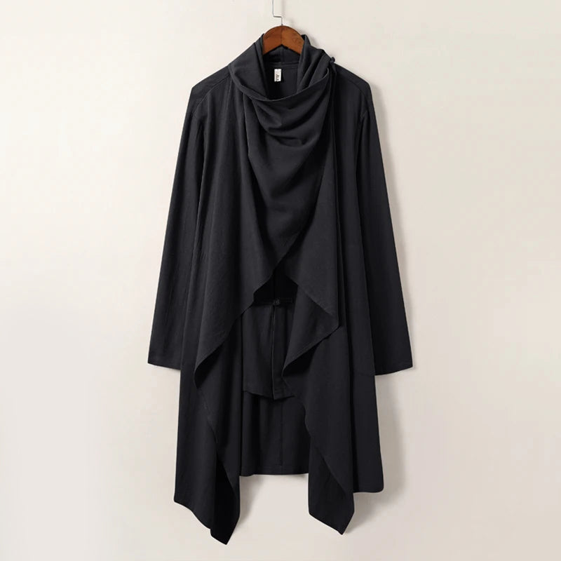 Ivory linen cape with flowing silhouette and traditional Japanese knot buttons