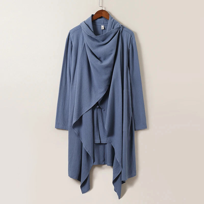 Ivory linen cape with flowing silhouette and traditional Japanese knot buttons