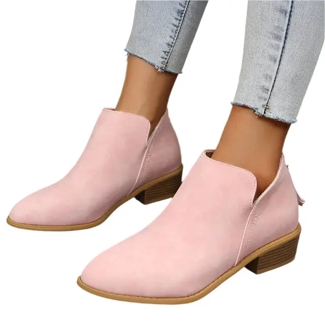 Women's tapered silhouette low heel boots in neutral tone, sleek streamlined profile for all-day wear