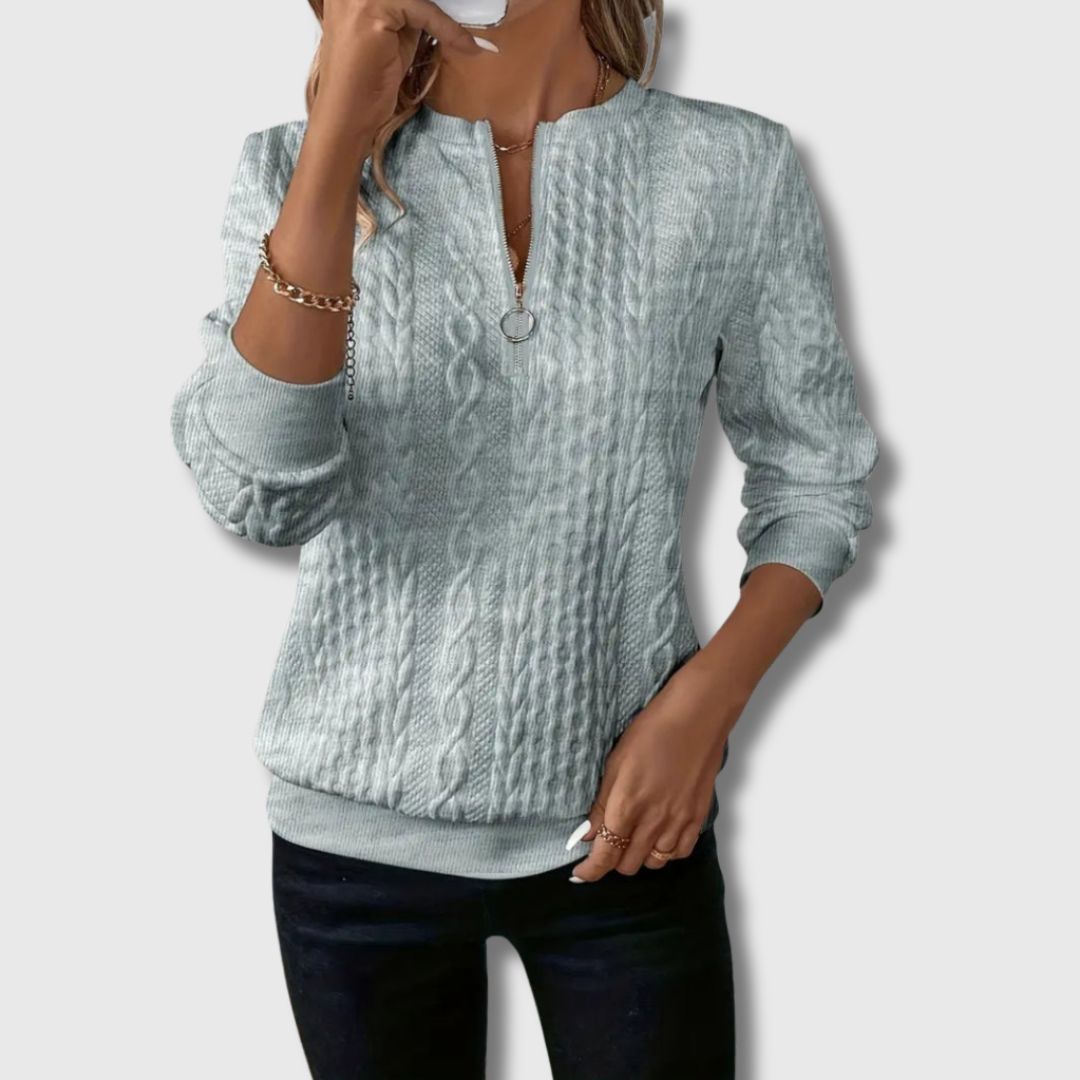 Elegant cream knit sweater with flattering silhouette and soft breathable premium fabric