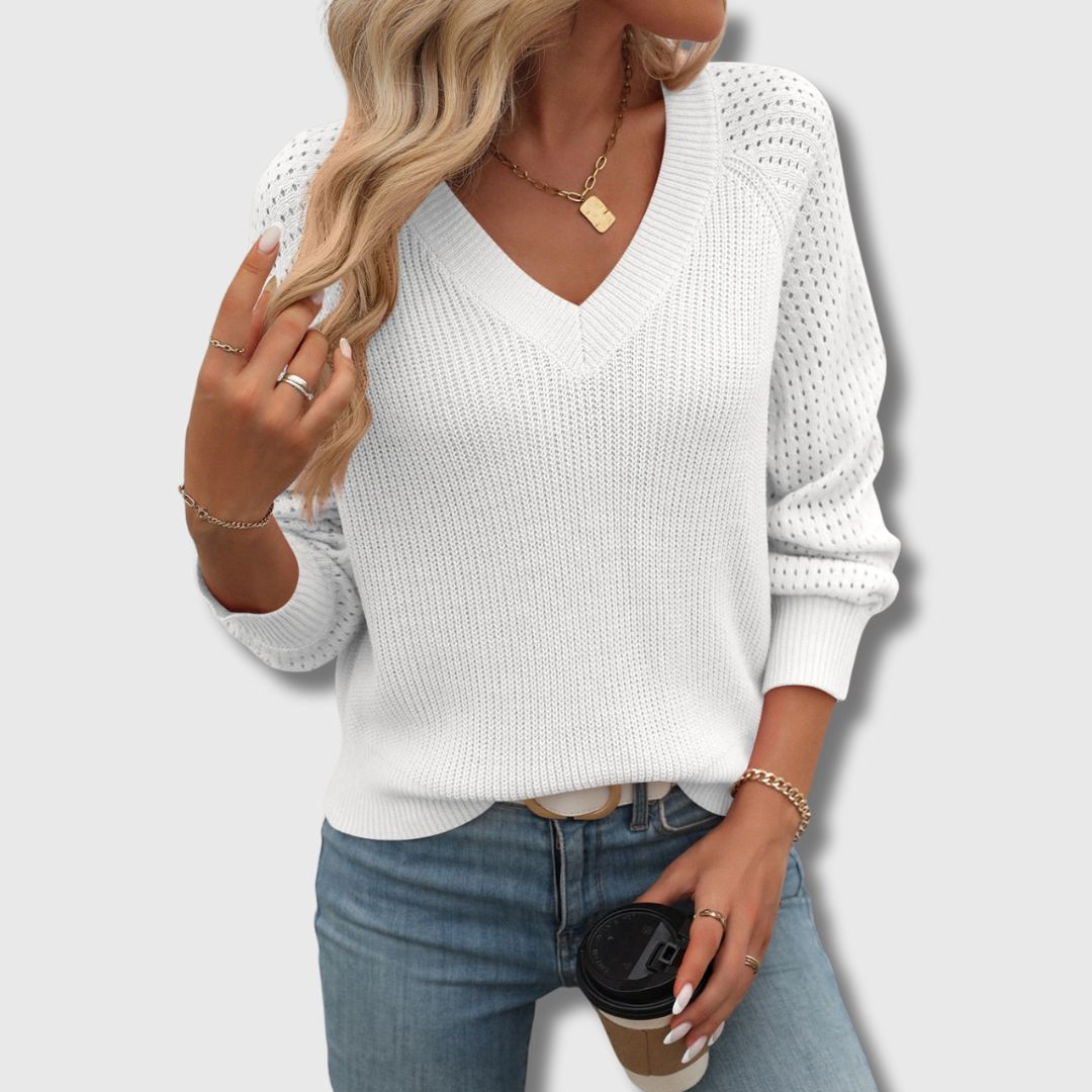 Elegant jade green V-neck sweater with flattering neckline and refined slim silhouette