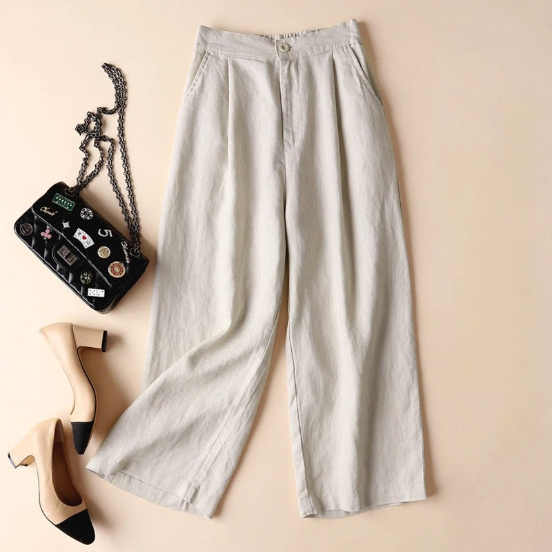 Taupe relaxed tapered linen pants with button-closure waist and side pockets in soft Tencel blend