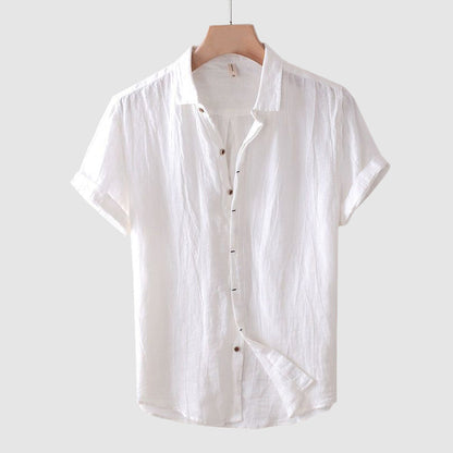 Men's beige linen short-sleeve shirt with turn-down collar and button closure, relaxed beach style