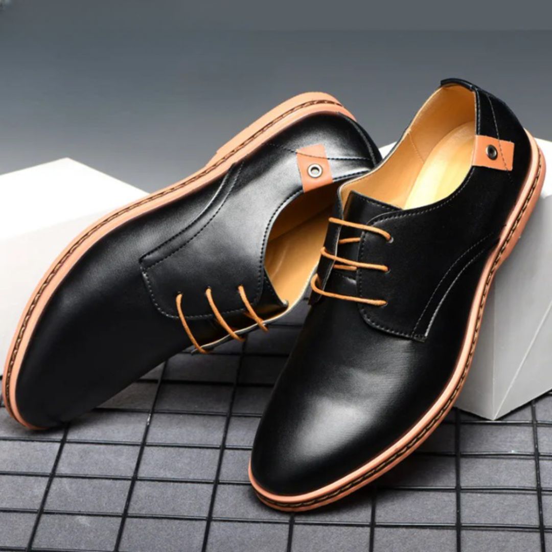 Black synthetic leather Derby shoes with clean lines and subtle contrast detailing for smart-casual style