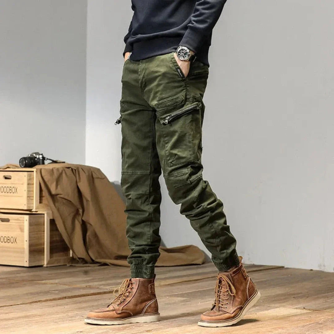 Men's olive utility cargo jogger pants with multi-pocket design and adjustable quick-dry fabric fit