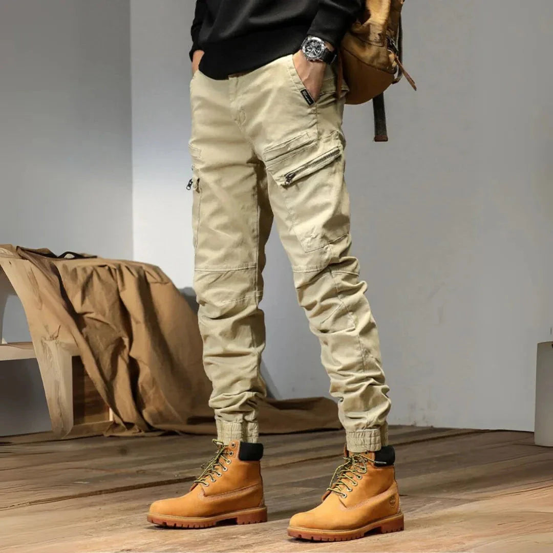 Men's olive utility cargo jogger pants with multi-pocket design and adjustable quick-dry fit