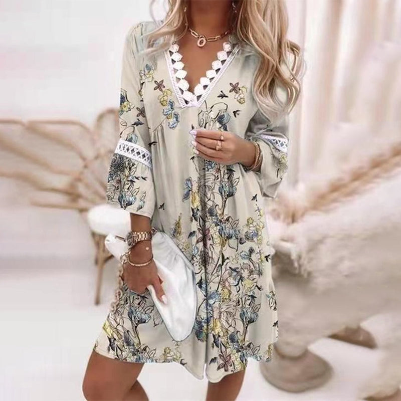 Boho loose fit printed mini dress for women, vibrant whimsical pattern, breezy silhouette