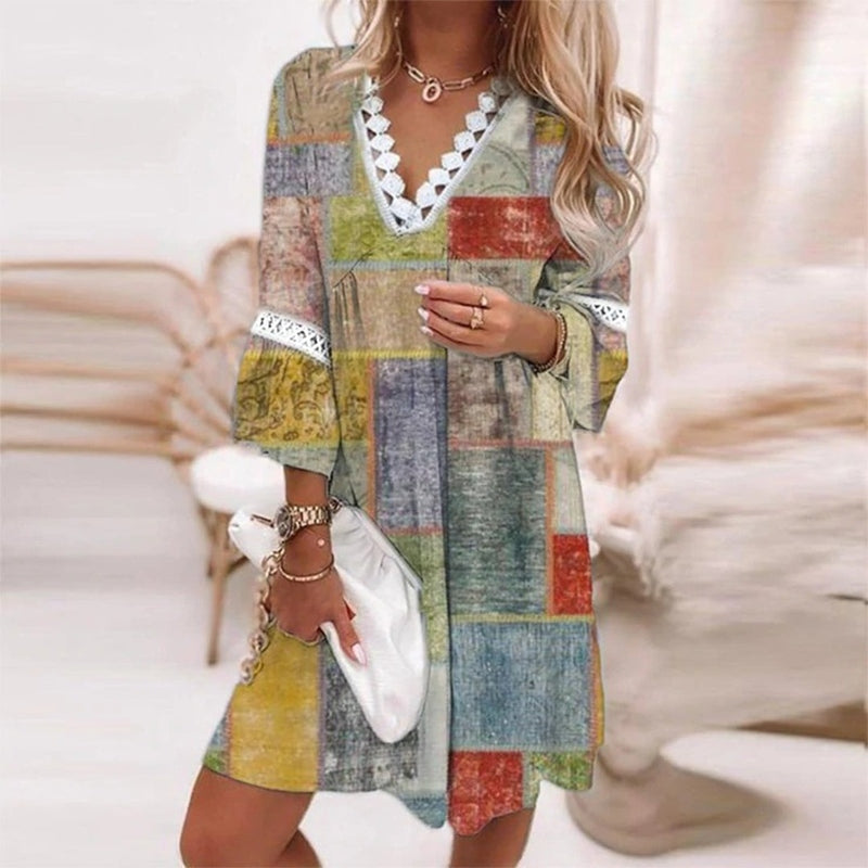 Boho loose fit printed mini dress for women, vibrant whimsical print, breezy evening silhouette
