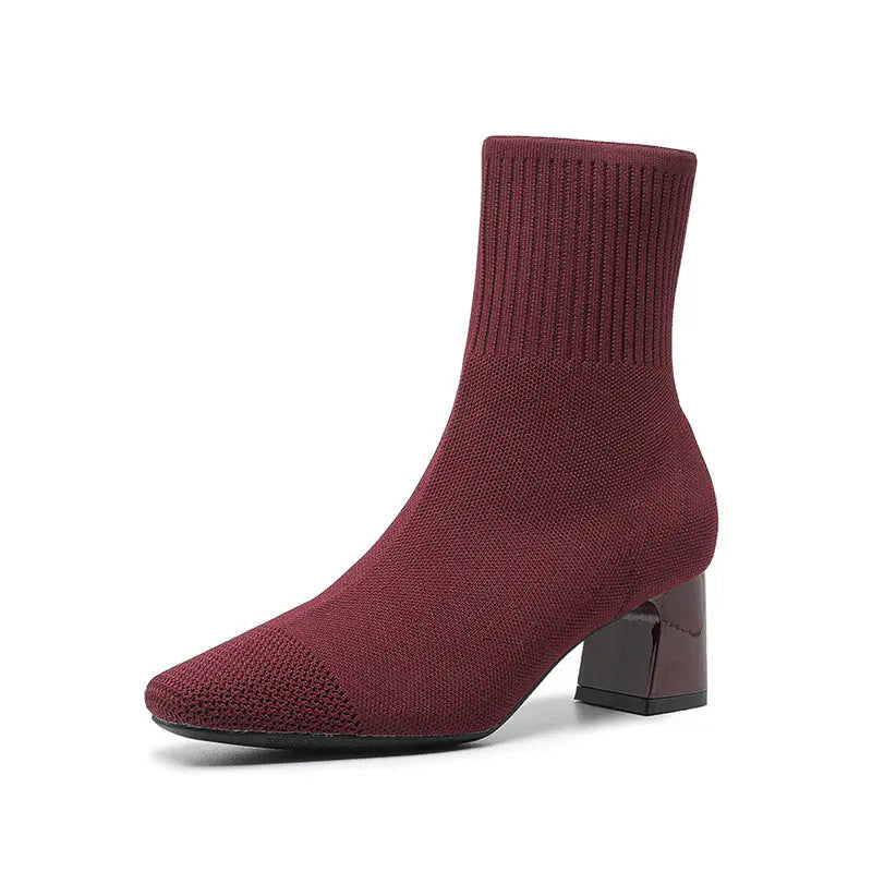 Women's black knit sock ankle boots with stretchy fabric and 2.5-inch mid-height heel