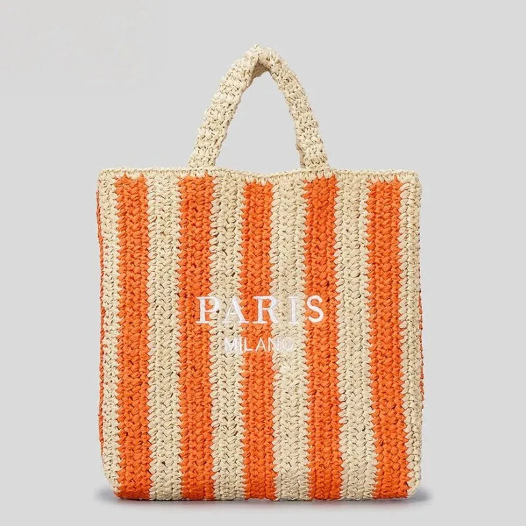 Handcrafted woven straw tote bag with bold vibrant orange stripes, lightweight beach and market carry-all