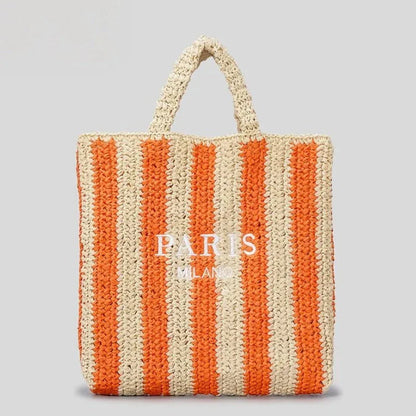 Handcrafted woven straw tote bag with bold vibrant orange stripes, lightweight beach and market carry-all
