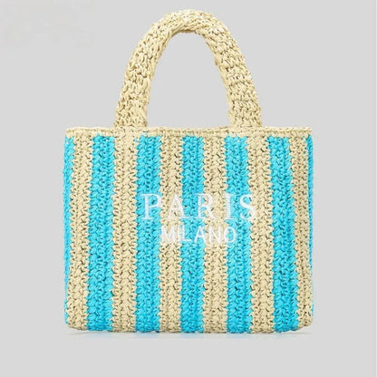 Handcrafted woven straw tote bag with bold vibrant orange stripes, lightweight beach and market carry-all