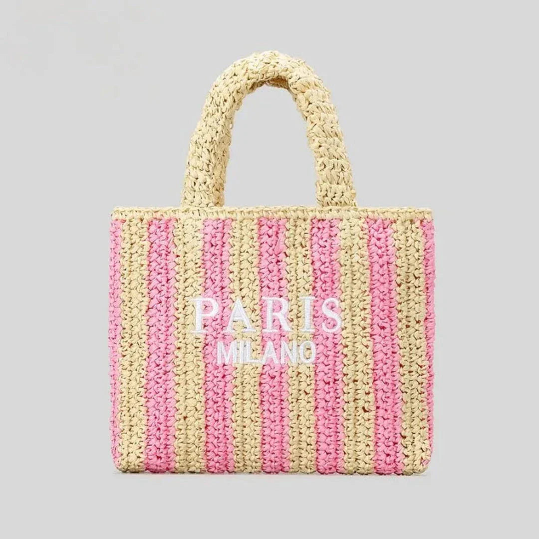 Handcrafted woven straw tote bag with bold vibrant orange stripes, lightweight beach and market carry