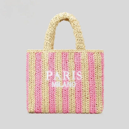 Handcrafted woven straw tote bag with bold vibrant orange stripes, lightweight beach and market carry
