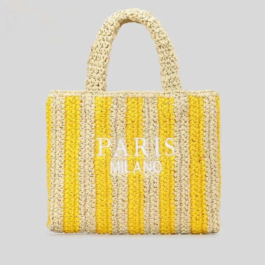 Handcrafted woven straw tote bag with vibrant orange stripes, lightweight beach and market carry-all