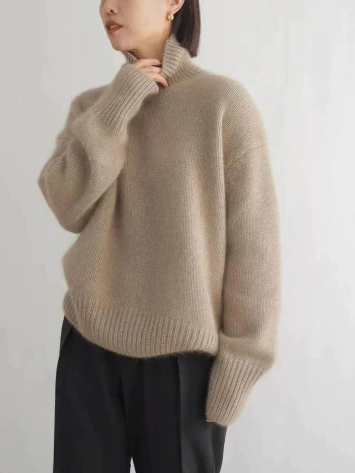Women's ivory turtleneck sweater slim-fit silhouette with smooth soft knit texture and high neckline