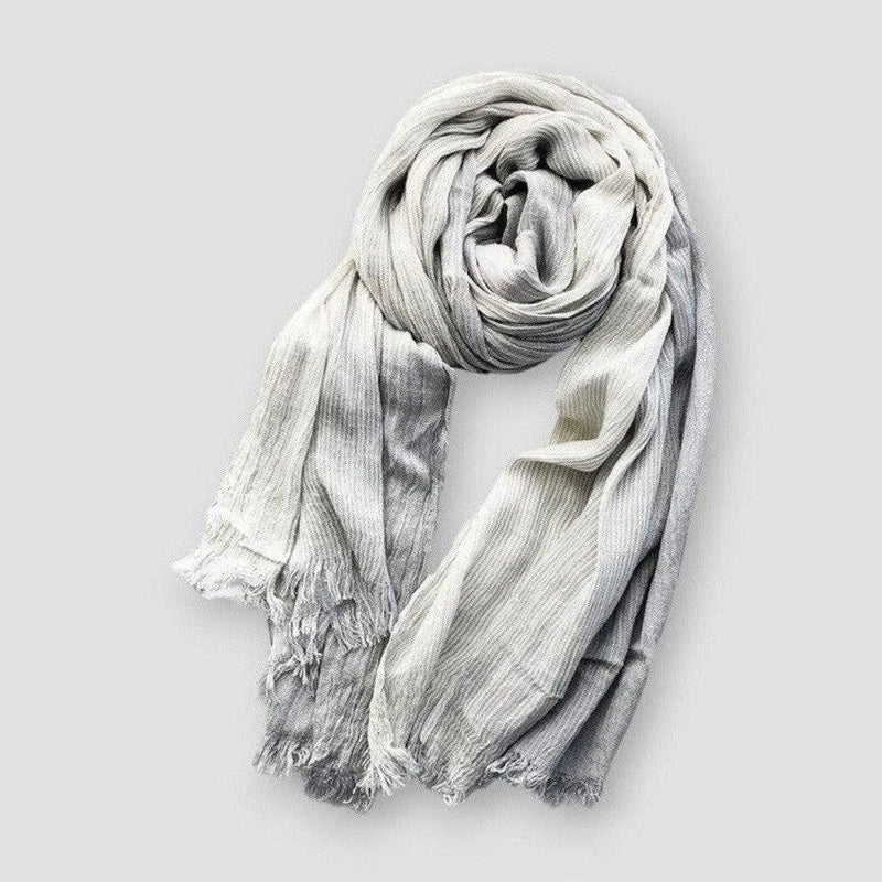 Two-tone textured fringe scarf in cotton-linen blend with subtle color contrast and fringed edges