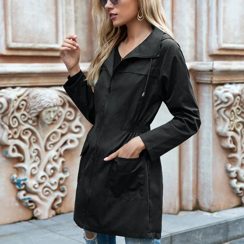 Women's lightweight hooded rain jacket with drawstring waist, weatherproof casual fit outerwear