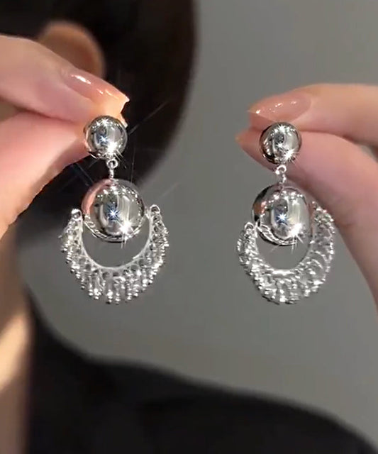 Boucles d'oreilles pendantes uniques en argent et soie Stergild - Wavlynn