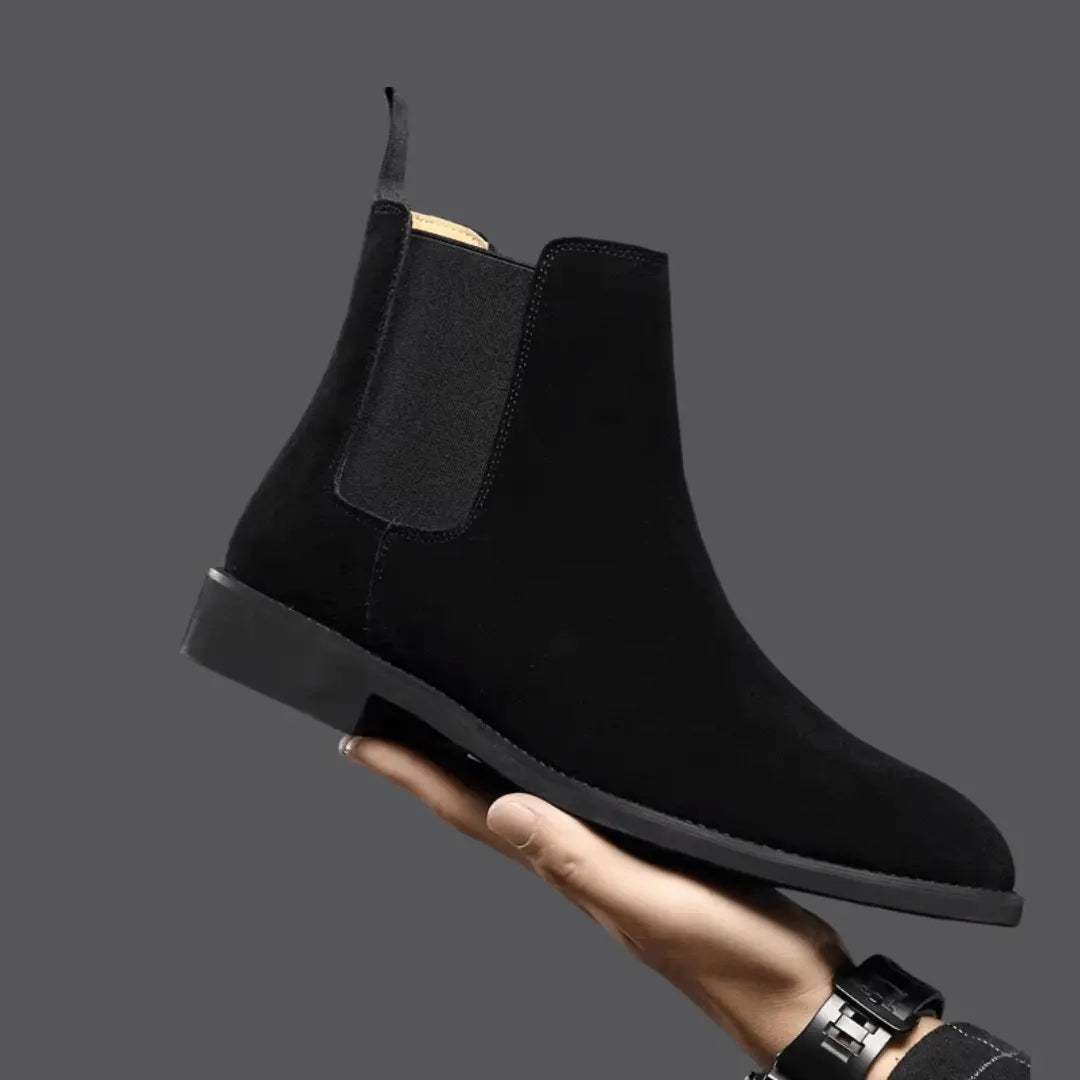 Olive green suede Chelsea boots with elastic side panels and sleek pull-tab, versatile everyday style