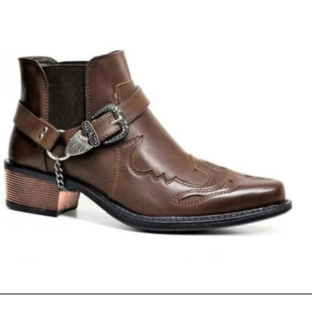 Men's brown winter western boots with pointed toe, angled heel, and bold buckle detail