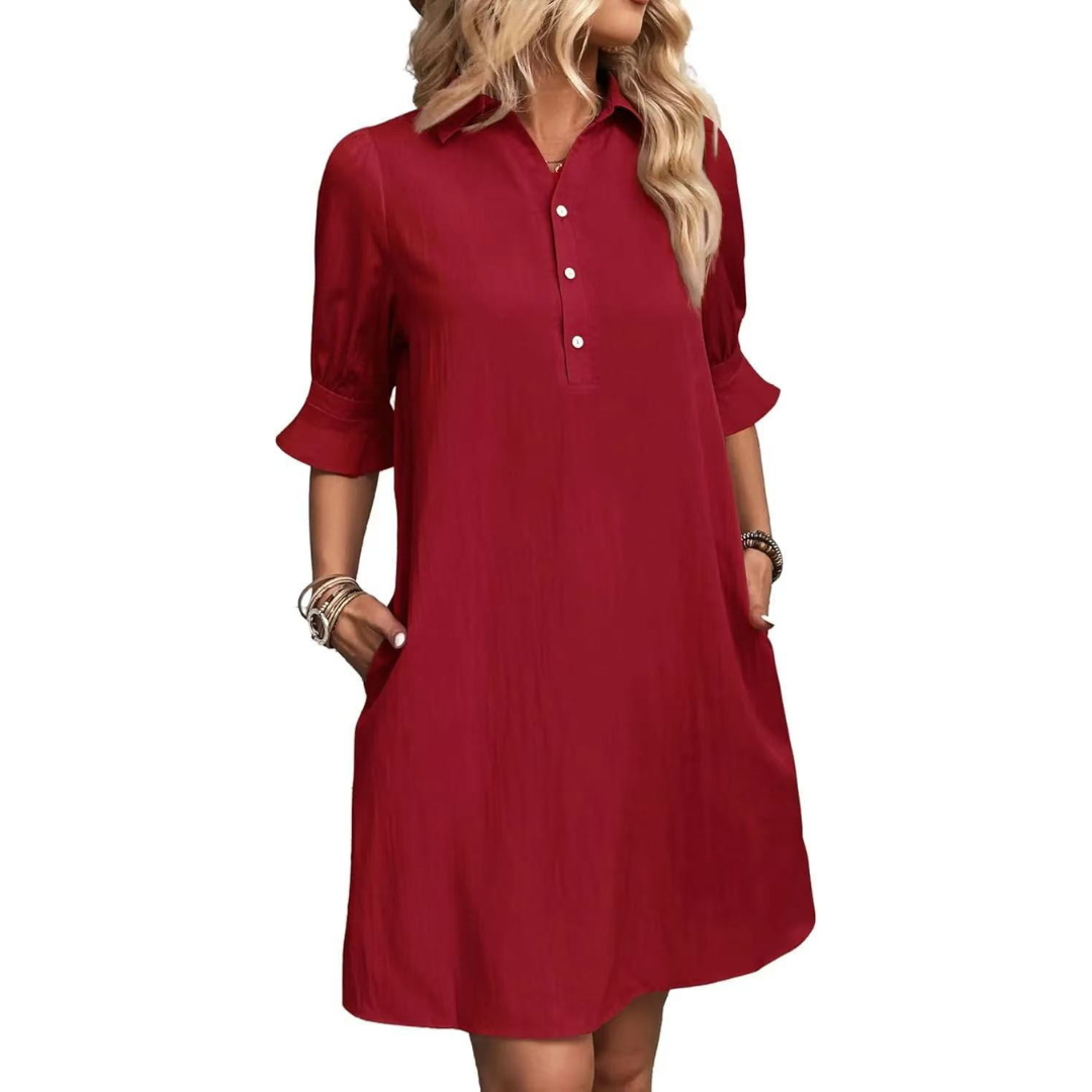 Black button-down shirt dress with flattering silhouette and classic button front detail