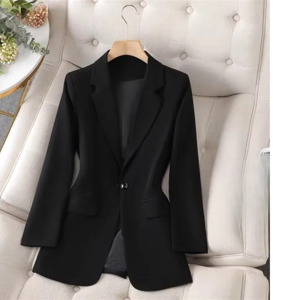 Women's green single-button blazer with sleek streamlined silhouette for a polished professional look
