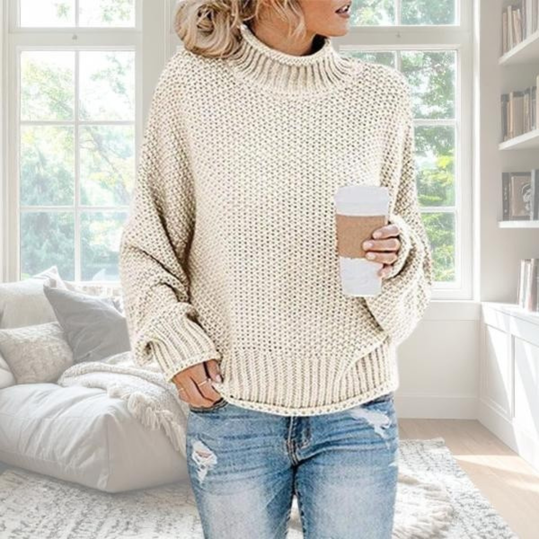 Beige soft knit relaxed pullover with graceful drape and understated elegant silhouette