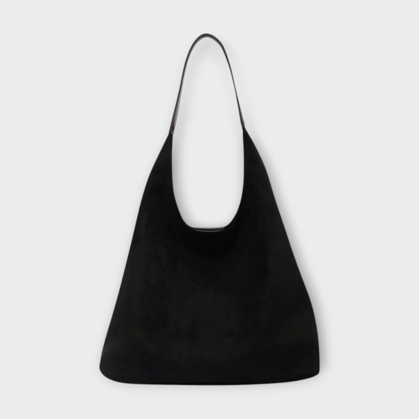 Minimalist beige shoulder bag with soft structured silhouette and simple single strap for everyday elegance