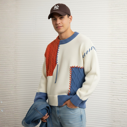 Loose-fit patchwork sweater with unique tonal stitching and complex multi-panel design