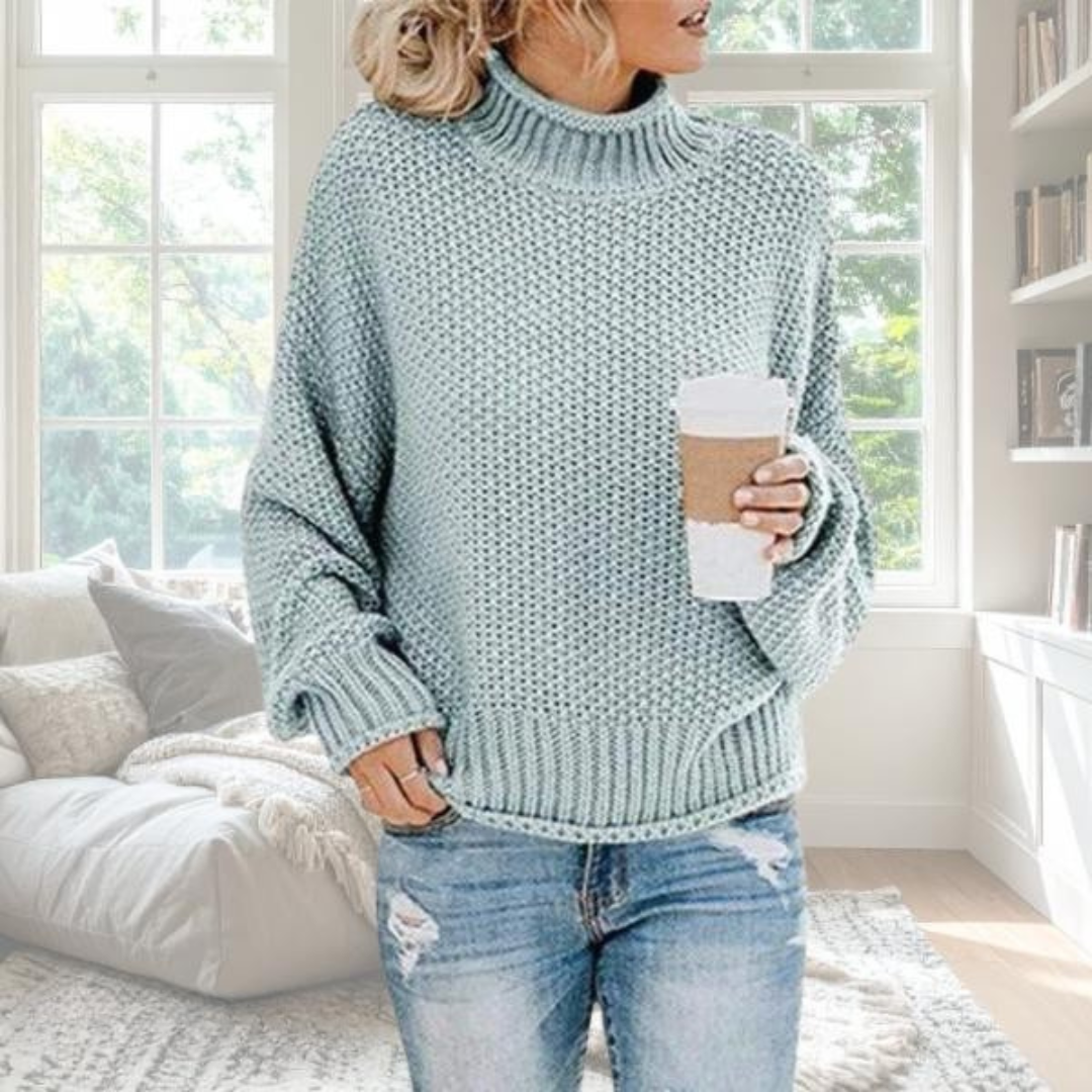 Beige soft knit relaxed pullover with graceful drape and understated elegant fit